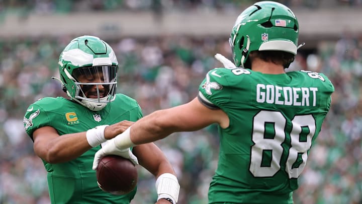 Oct 26, 2025; Philadelphia, Pennsylvania, USA; Philadelphia Eagles tight end Dallas Goedert (88) celebrates with quarterback Jalen Hurts (1) after scoring a touchdown against the New York Giants in the fourth quarter at Lincoln Financial Field.