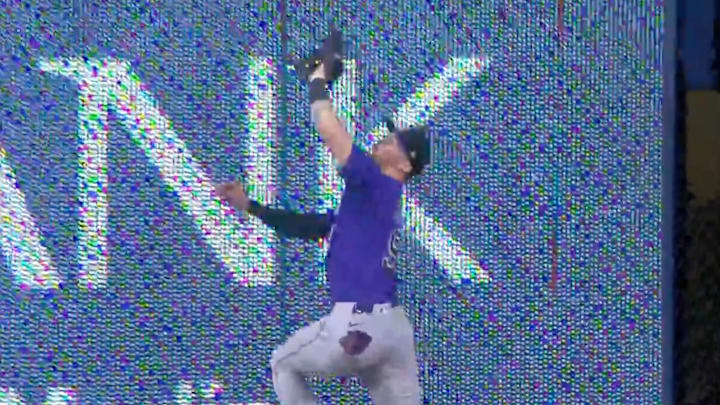 Colorado Rockies outfielder Brenton Doyle catches a ball. Colorado Rockies outfielder Brenton Doyle catches a ball.