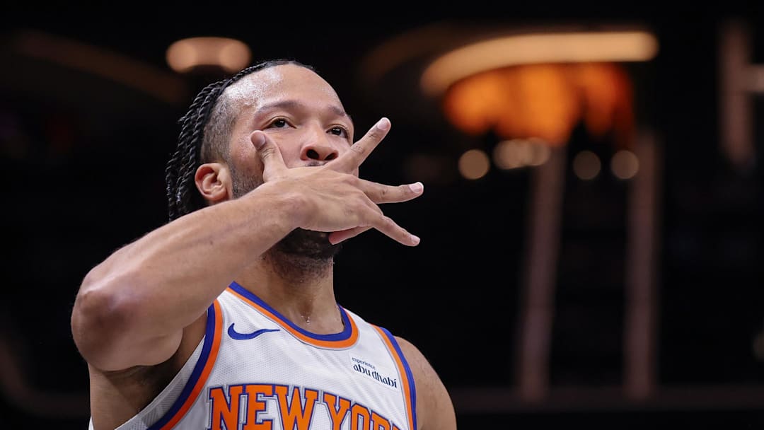 Nov 24, 2025; Brooklyn, New York, USA; New York Knicks guard Jalen Brunson (11) reacts after making a three point basket during the first quarter against the Brooklyn Nets at Barclays Center. Mandatory Credit: Vincent Carchietta-Imagn Images