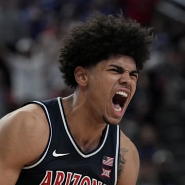 Nov 3, 2025; Las Vegas, NV, USA; Arizona Wildcats forward Koa Peat (10) celebrates a play against the Florida Gators in the second half of the Hall of Fame Series game at T-Mobile Arena. Mandatory Credit: Candice Ward-Imagn Images