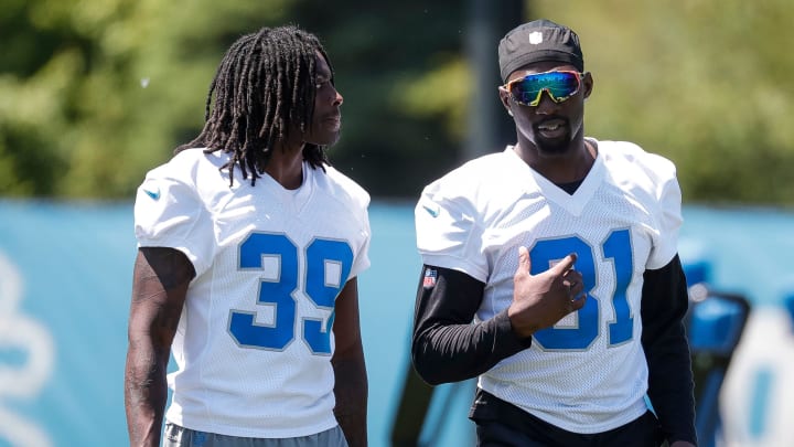 Detroit Lions cornerback Morice Norris (39) talks to safety Kerby Joseph (31) 