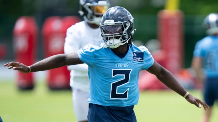 Running back Tyjae Spears (2) goes through warmups during Tennessee Titans practice at Ascension Saint Thomas Sports Park in Nashville, Tenn., Wednesday, May 29, 2024.