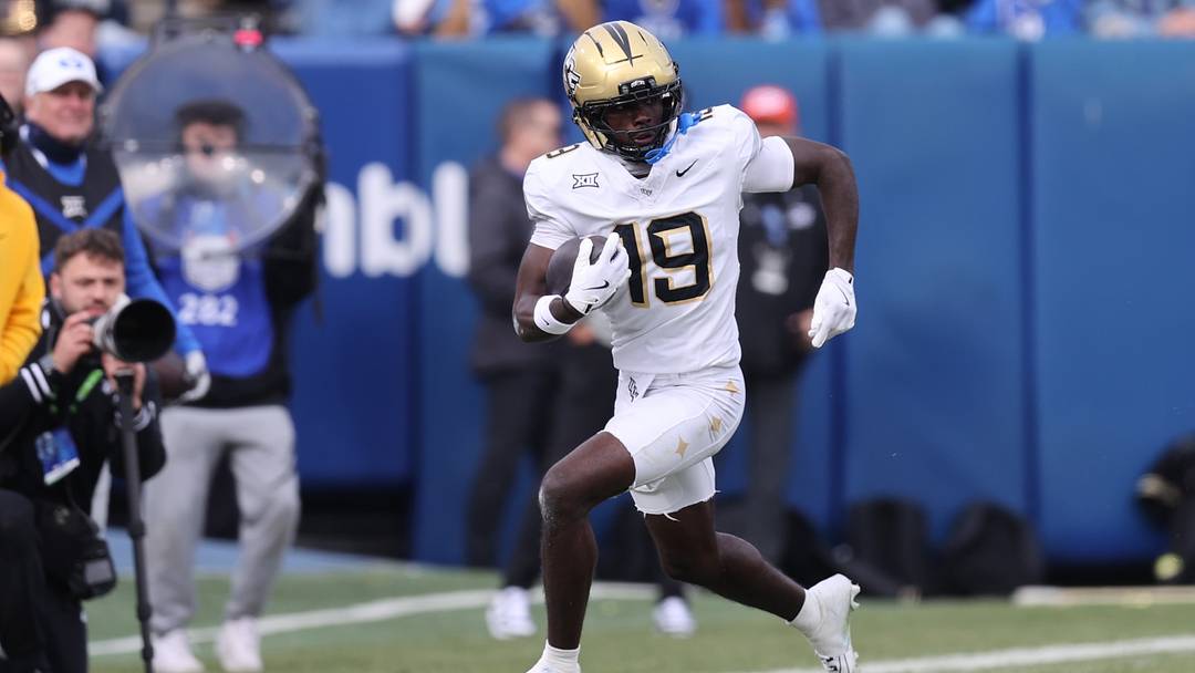 Nov 29, 2025; Provo, Utah, USA; UCF Knights wide receiver Waden Charles (19) runs after a catch against the BYU Cougars during the second half at LaVell Edwards Stadium. Mandatory Credit: Rob Gray-Imagn Images Nov 29, 2025; Provo, Utah, USA; UCF Knights wide receiver Waden Charles (19) runs after a catch against the BYU Cougars during the second half at LaVell Edwards Stadium. Mandatory Credit: Rob Gray-Imagn Images
