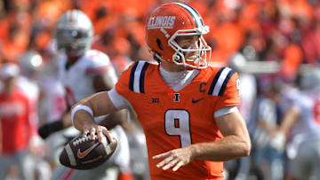 Oct 11, 2025; Champaign, Illinois, USA;  Illinois Fighting Illini quarterback Luke Altmyer (9) passes against the Ohio State Buckeyes during the second half at Memorial Stadium. Mandatory Credit: Ron Johnson-Imagn Images