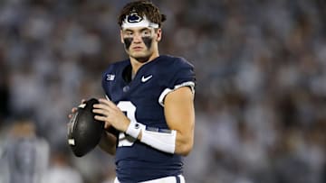 Sep 28, 2024; University Park, Pennsylvania, USA; Penn State Nittany Lions quarterback Beau Pribula (9) warms up during the fourth quarter against the Illinois Fighting Illini at Beaver Stadium. Penn State defeated Illinois 21-7. Mandatory Credit: Matthew O'Haren-Imagn Images