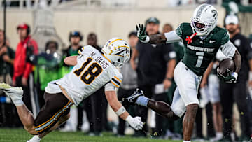 Michigan State wide receiver Omari Kelly (1) runs against Western Michigan safety Micah Davis (18) during the first half at Spartan Stadium in East Lansing on Friday, August 29, 2025.
