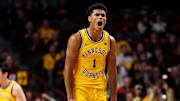 Minnesota Golden Gophers guard Isaac Asuma (1) celebrates his three-point basket 