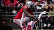 April 13, 2024; Columbus, Ohio, USA; 
Ohio State Buckeyes wide receiver Jeremiah Smith (4) canÕt catch a pass for the scarlet team while defended by cornerback Jermaine Mathews (24) of the grey team during the first half of the LifeSports Spring Game at Ohio Stadium on Saturday.