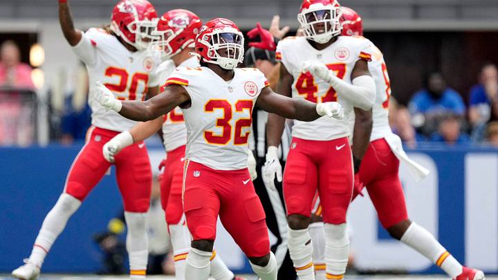 Kansas City Chiefs players including Kansas City Chiefs linebacker Nick Bolton (32) celebrate after stopping the Indianapolis Colts on fourth down Sunday, Sept. 25, 2022, during a game against the Kansas City Chiefs at Lucas Oil Stadium in Indianapolis.