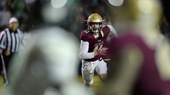 St. Augustine's Locklan Hewlett (11) scrambles to the end zone for a touchdown during third quarter action. The Choctawhatchee Indians traveled to Saint Augustine High School to take on the Yellow Jackets in the FHSAA Region 1-3A High School Football Finals Friday, November 24, 2023. The Yellow Jackets led 21 to 17 at the half and came away with a 35 to 26 victory. St. Augustine's Locklan Hewlett (11) scrambles to the end zone for a touchdown during third quarter action. The Choctawhatchee Indians traveled to Saint Augustine High School to take on the Yellow Jackets in the FHSAA Region 1-3A High School Football Finals Friday, November 24, 2023. The Yellow Jackets led 21 to 17 at the half and came away with a 35 to 26 victory.