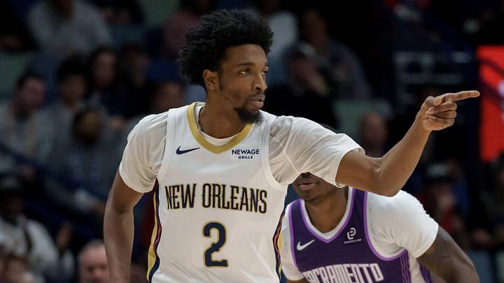 Feb 9, 2026; New Orleans, Louisiana, USA; New Orleans Pelicans forward Herbert Jones (2) reacts after a basket against Sacramento Kings guard Daeqwon Plowden (29) during the first half at Smoothie King Center. Mandatory Credit: Matthew Hinton-Imagn Images