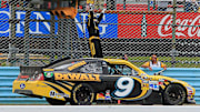 Aug 12, 2012; Watkins Glen, NY, USA; NASCAR Sprint Cup Series driver Marcos Ambrose (9) celebrates winning the Finger Lakes 335 at The Glen at Watkins Glen International.