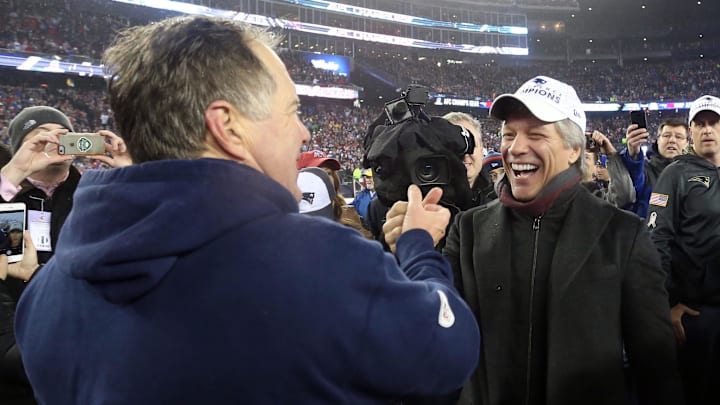 Jon Bon Jovi celebrates with Bill Belichick after Patriots advance to 2017 Super Bowl.