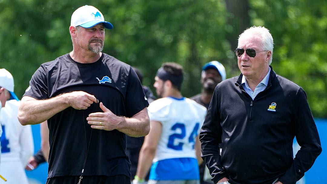 Detroit Lions head coach Dan Campbell, left, talks to president Rod Wood after practice during OTA at Meijer Performance Center in Allen Park on Friday, May 30, 2025.