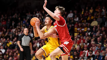 Mar 5, 2025; Minneapolis, Minnesota, USA; Minnesota Golden Gophers forward Dawson Garcia (3) works around Wisconsin Badgers forward Nolan Winter (31) during the first half at Williams Arena. Mandatory Credit: Matt Krohn-Imagn Images