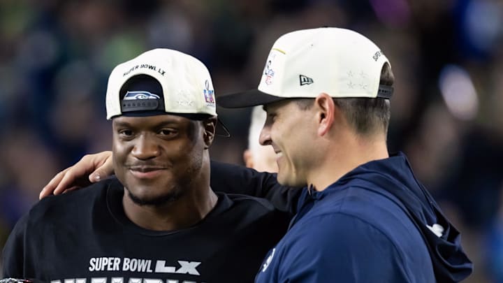 Seattle Seahawks head coach Mike Macdonald and running back Kenneth Walker III celebrate