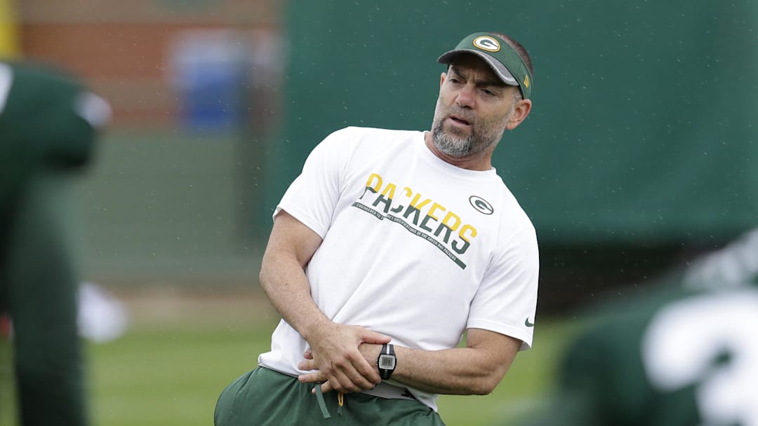 Jul 28, 2016; Green Bay,WI, USA; Green Bay Packers strength and conditioning coordinator Mark Lovat leads stretching exercises during the training camp across from Lambeau Field. Mandatory Credit: Mark Hoffman/ via Imagn Images
