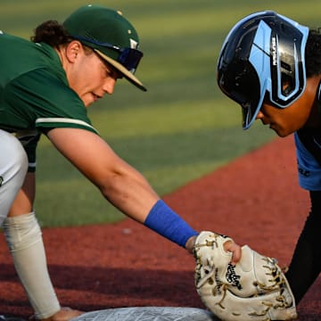 Israel Montanez of Rockledge, right, dives back to first before Viera’s Brennan Confreda can make the tag during the 2024 Cape Coast Conference championship. Last week, Confreda went 3-for-4 with one run scored and two RBI to lead the Hawks past Melbourne, 10-2. Craig Bailey/FLORIDA TODAY via USA TODAY NETWORK