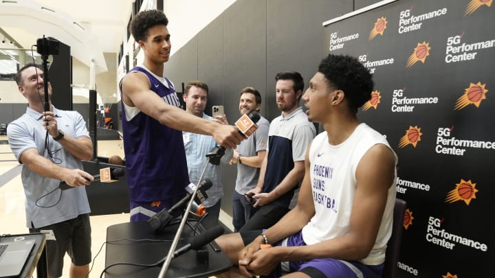 Forward Oso Ighodaro interviews forward Ryan Dunn during the Suns Summer League at Verizon 5G Performance Center on July 9, 2024, in Phoenix.