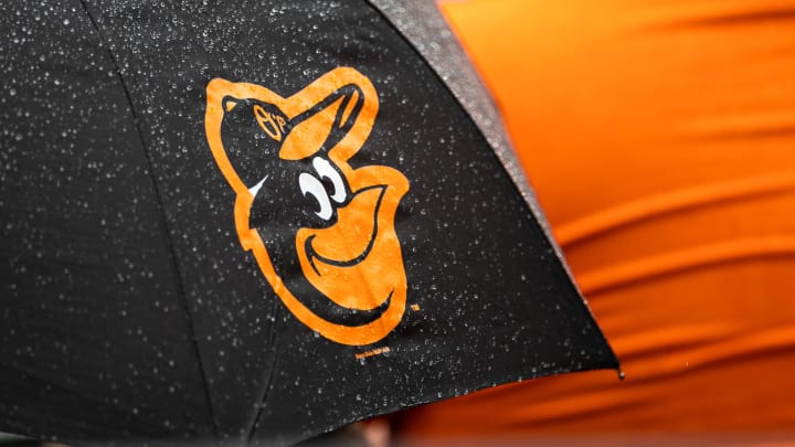 Aug 22, 2021; Baltimore, Maryland, USA; A Baltimore Orioles logo is seen on an umbrella during the game between the Baltimore Orioles and the Atlanta Braves at Oriole Park at Camden Yards. Mandatory Credit: Scott Taetsch-USA TODAY Sports