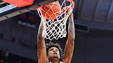 Nov 3, 2025; Syracuse, New York, USA; Syracuse Orange forward Sadiq White Jr. (0) dunks the ball against the Binghamton Bearcats in the second half at the JMA Wireless Dome. Mandatory Credit: Mark Konezny-Imagn Images