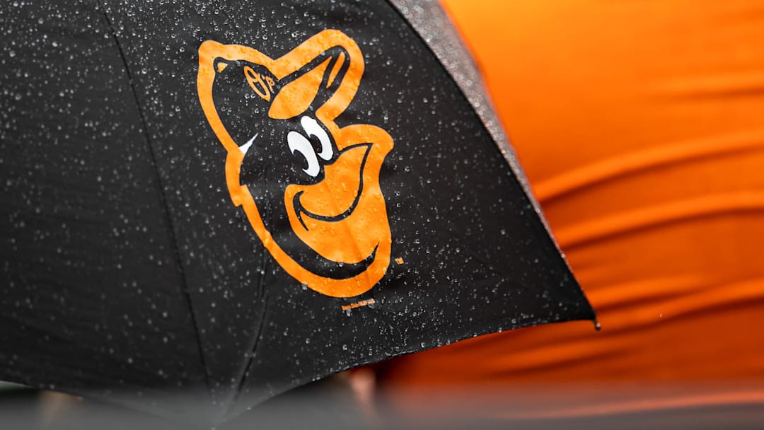Aug 22, 2021; Baltimore, Maryland, USA; A Baltimore Orioles logo is seen on an umbrella during the game between the Baltimore Orioles and the Atlanta Braves at Oriole Park at Camden Yards. Mandatory Credit: Scott Taetsch-Imagn Images