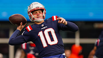 Jan 5, 2025; Foxborough, Massachusetts, USA; New England Patriots quarterback Drake Maye (10) warms up before the start of the game against the Buffalo Bills at Gillette Stadium. Mandatory Credit: David Butler II-Imagn Images