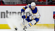 Mar 16, 2024; Detroit, Michigan, USA;  Buffalo Sabres right wing JJ Peterka (77) skates with the puck in the first period against the Detroit Red Wings at Little Caesars Arena. Mandatory Credit: Rick Osentoski-Imagn Images
