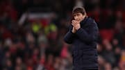Antonio Conte sheepishly applauds Tottenham's fans after losing to Manchester United on Saturday