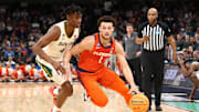 Mar 24, 2024; Memphis, TN, USA; Clemson Tigers guard Chase Hunter (1) controls the ball against Baylor Bears guard Ja'Kobe Walter (4) in the first half in the second round of the 2024 NCAA Tournament at FedExForum. Mandatory Credit: Petre Thomas-USA TODAY Sports