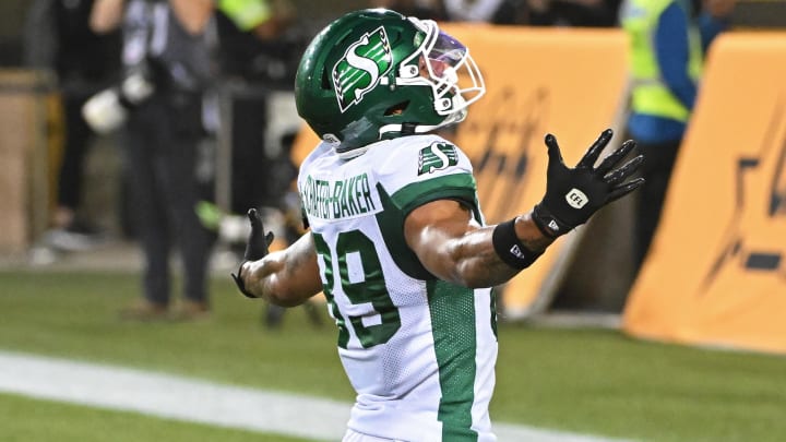 Jun 16, 2024; Hamilton, Ontario, CAN; Saskatchewan Rough Riders wide receiver Kian Baker (89) celebrates a fourth quarter touchdown against the Hamilton Tiger Cats at Tim Hortons Field. Mandatory Credit: Gerry Angus-USA TODAY Sports