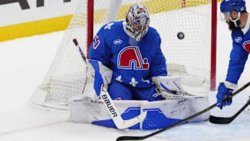 Oct 23, 2025; Denver, Colorado, USA; Colorado Avalanche goaltender Trent Miner (50) defends the net in the third period against the Carolina Hurricanes at Ball Arena. Mandatory Credit: Ron Chenoy-Imagn Images
