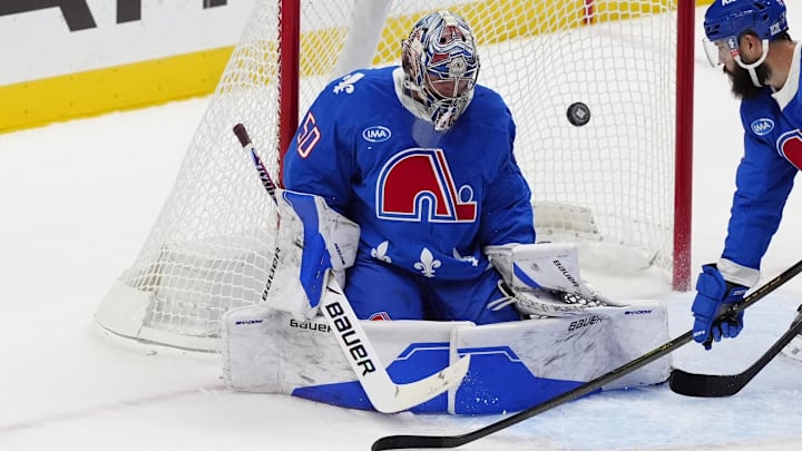 Oct 23, 2025; Denver, Colorado, USA; Colorado Avalanche goaltender Trent Miner (50) defends the net in the third period against the Carolina Hurricanes at Ball Arena. Mandatory Credit: Ron Chenoy-Imagn Images