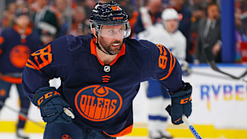 Edmonton Oilers forward Sam Gagner chases a loose puck against the Tampa Bay Lightning.