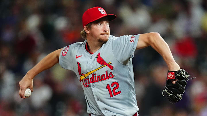 Sep 25, 2024; Denver, Colorado, USA; St. Louis Cardinals starting pitcher Erick Fedde (12) delivers a pitch in the eighth inning against the Colorado Rockies at Coors Field. Mandatory Credit: Ron Chenoy-Imagn Images