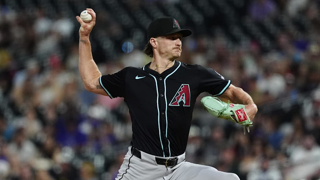 Jun 21, 2025; Denver, Colorado, USA; Arizona Diamondbacks relief pitcher Shelby Miller (18) delivers a pitch in the ninth inning against the Colorado Rockies at Coors Field. Mandatory Credit: Ron Chenoy-Imagn Images