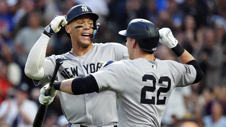 New York Yankees right fielder Aaron Judge, right, celebrates a home run with Ben Rice