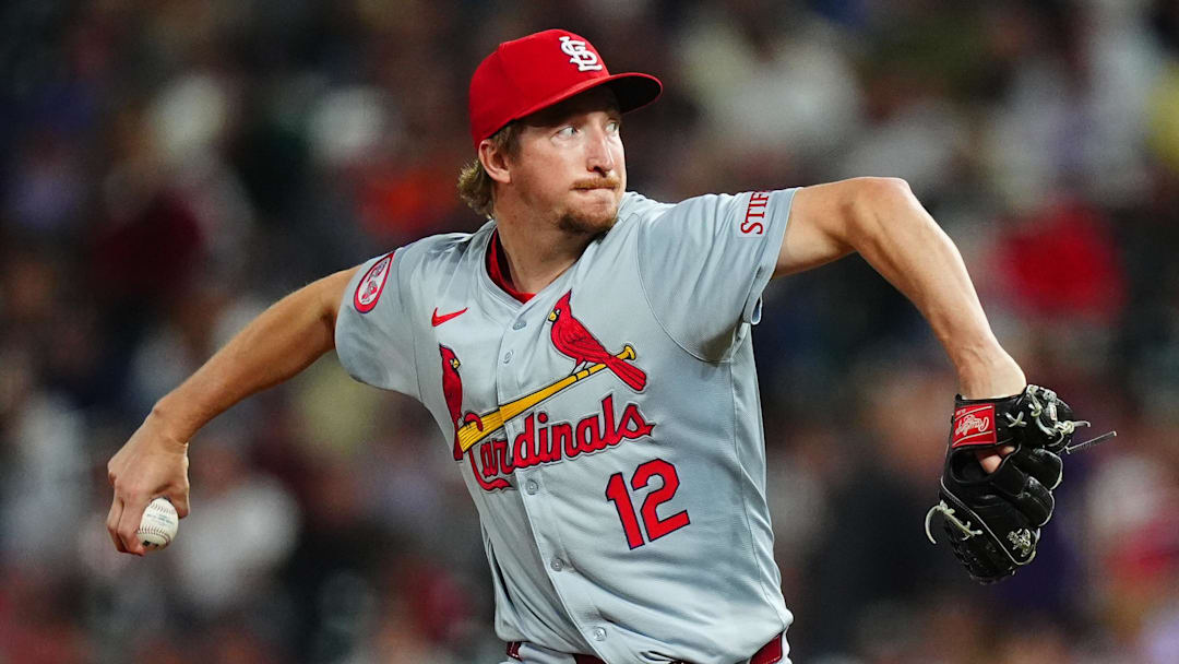 Sep 25, 2024; Denver, Colorado, USA; St. Louis Cardinals starting pitcher Erick Fedde (12) delivers a pitch in the eighth inning against the Colorado Rockies at Coors Field. Mandatory Credit: Ron Chenoy-Imagn Images