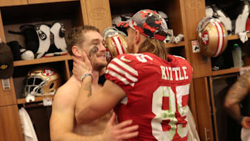 San Francisco 49ers tight ends Ross Dwelley (L) and George Kittle (R)