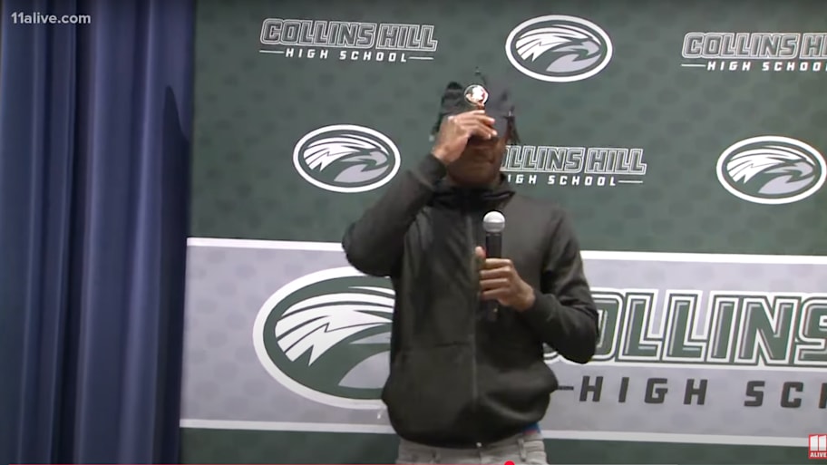 Travis Hunter rocked a Florida State hat at his commitment to Jackson State. | Photo via 11Alive on YouTube.