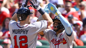 Jul 12, 2025; St. Louis, Missouri, USA;  Atlanta Braves catcher Sean Murphy (12) celebrates with right fielder Ronald Acuna Jr (13) after hitting a go ahead three run home run against the St. Louis Cardinals during the eighth inning at Busch Stadium. Mandatory Credit: Jeff Curry-Imagn Images