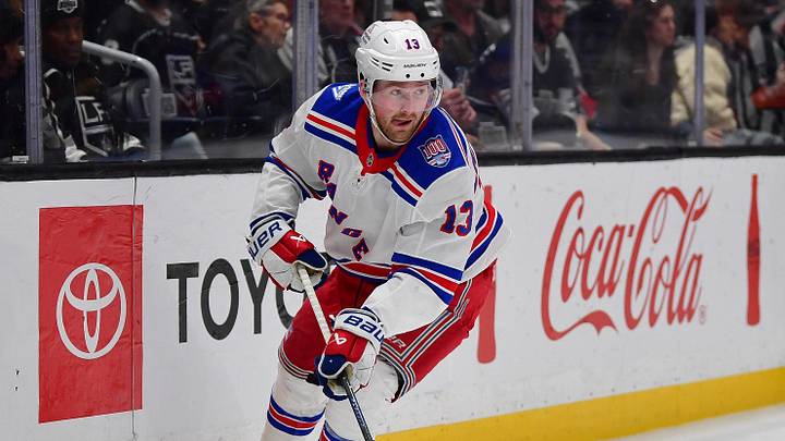 Jan 20, 2026; Los Angeles, California, USA; New York Rangers left wing Alexis Lafreniere (13) moves the puck against the Los Angeles Kings during the third period at Crypto.com Arena. Jan 20, 2026; Los Angeles, California, USA; New York Rangers left wing Alexis Lafreniere (13) moves the puck against the Los Angeles Kings during the third period at Crypto.com Arena.