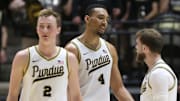 Purdue Boilermakers guard Fletcher Loyer (2), forward Trey Kaufman-Renn (4), and guard Braden Smith (3) huddle up 