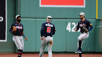 May 18, 2025; Boston, Massachusetts, USA;  Atlanta Braves center fielder Michael Harris II (23) left fielder Alex Verdugo (8) and right fielder Eli White (36) react after defeating the Boston Red Sox at Fenway Park. Mandatory Credit: Bob DeChiara-Imagn Images