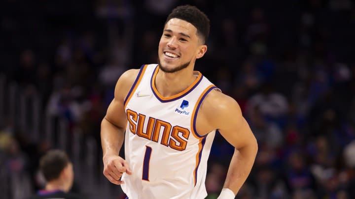 Jan 16, 2022; Detroit, Michigan, USA; Phoenix Suns guard Devin Booker (1) smiles just after the second quarter against the Detroit Pistons at Little Caesars Arena. Mandatory Credit: Raj Mehta-USA TODAY Sports