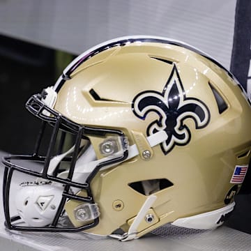 Nov 5, 2023; New Orleans, Louisiana, USA;  Detailed view of the New Orleans Saints helmet on the team bench against the Chicago Bears during the first half at the Caesars Superdome. Mandatory Credit: Stephen Lew-Imagn Images