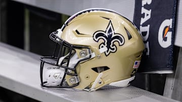Nov 5, 2023; New Orleans, Louisiana, USA;  Detailed view of the New Orleans Saints helmet on the team bench against the Chicago Bears during the first half at the Caesars Superdome. Mandatory Credit: Stephen Lew-Imagn Images