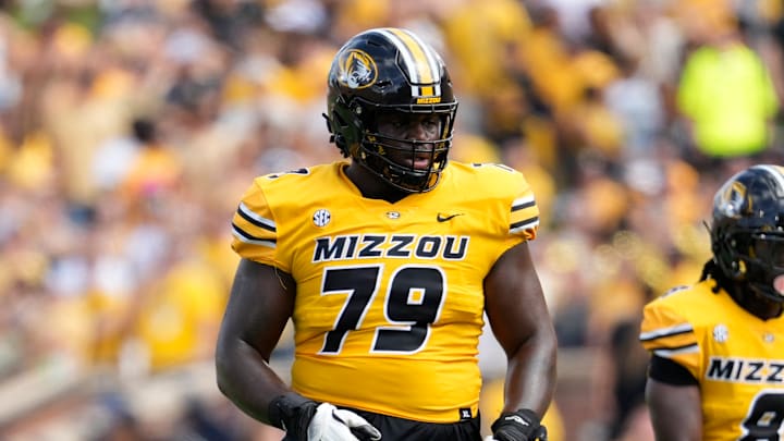 Missouri Tigers offensive lineman Armand Membou (79)