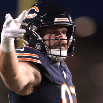 Tight end Tommy Sweeney signals first down after a catch in Thursday's preseason opener. Tight ends had six catches.