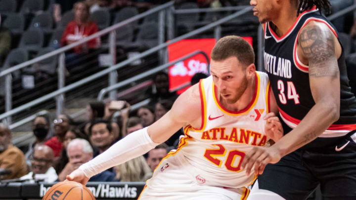 Mar 27, 2024; Atlanta, Georgia, USA; Atlanta Hawks guard Dylan Windler (20) drives the ball to the basket against Portland Trail Blazers forward Jabari Walker (34) during the fourth quarter at State Farm Arena. Mandatory Credit: Jordan Godfree-USA TODAY Sports